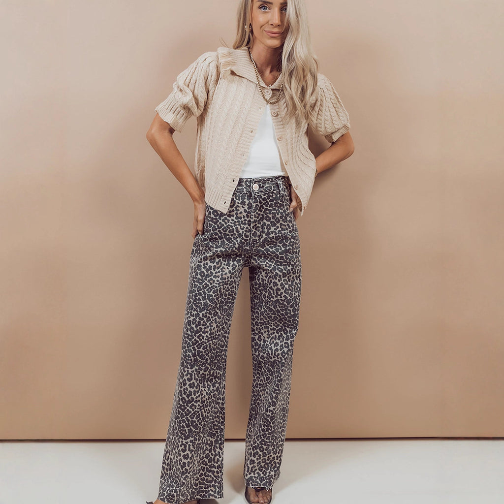 New High-waisted Slightly Flared Trousers With A Unique Print