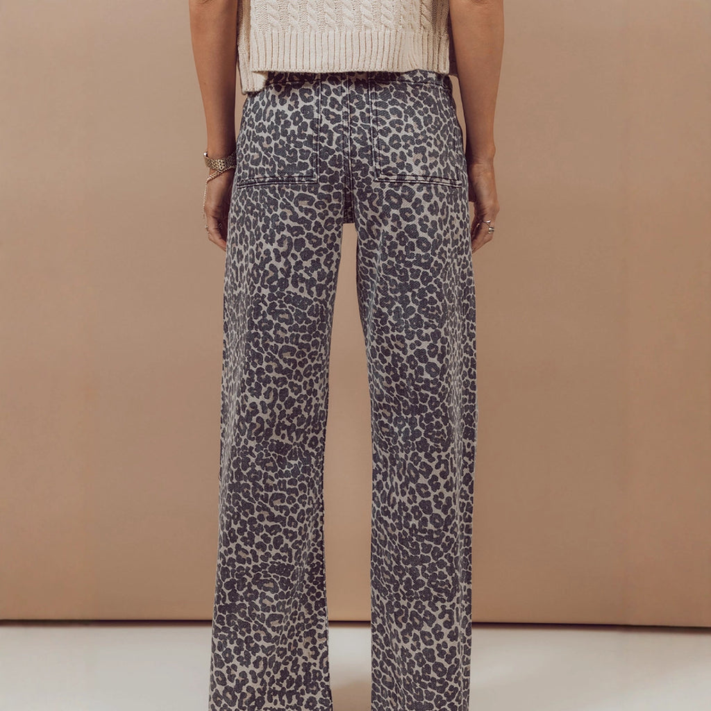 New High-waisted Slightly Flared Trousers With A Unique Print