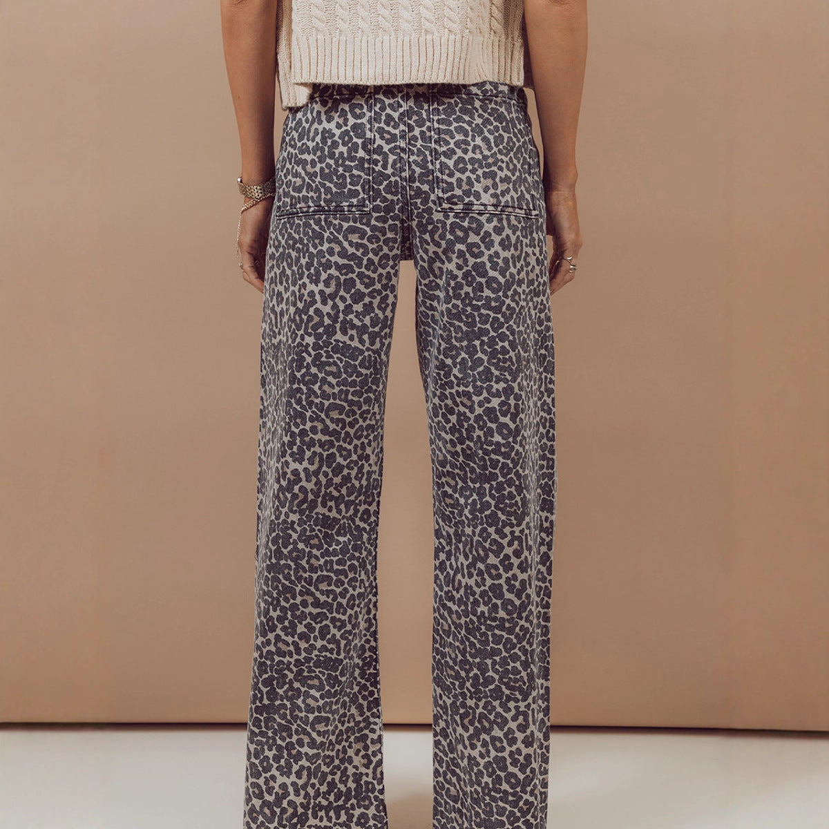 New High-waisted Slightly Flared Trousers With A Unique Print