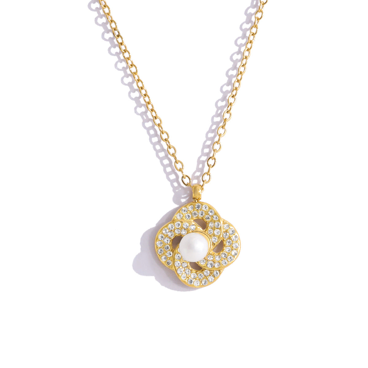 Zircon Pendant Encircling A Pearl Necklace