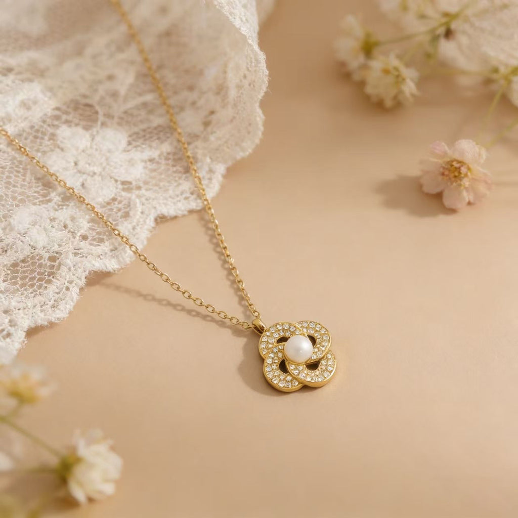 Zircon Pendant Encircling A Pearl Necklace